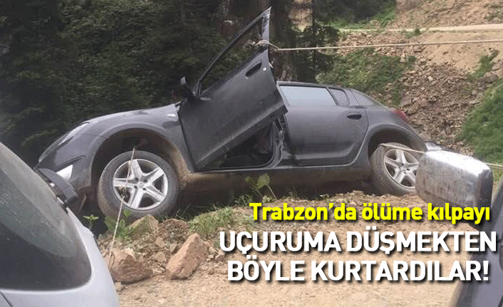 Trabzon'da devrilen aracı uçurumdan halatla kurtardılar