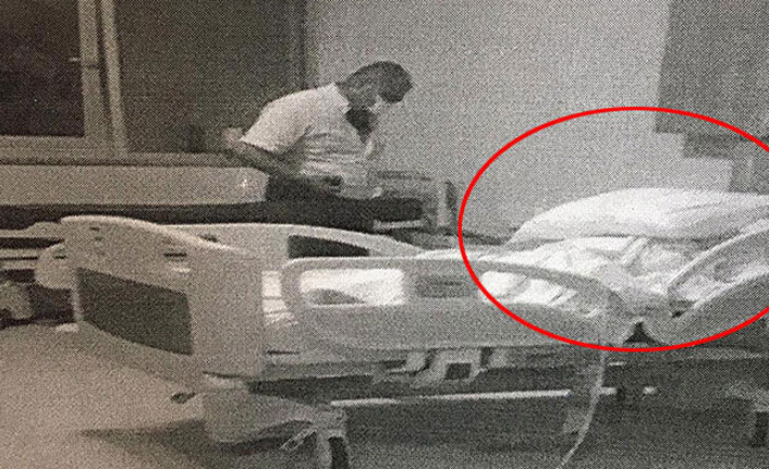 Hastane odasında boğmaya çalışırken yakalandı