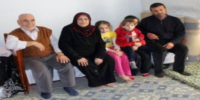 Suriyeli aileye evini açtı