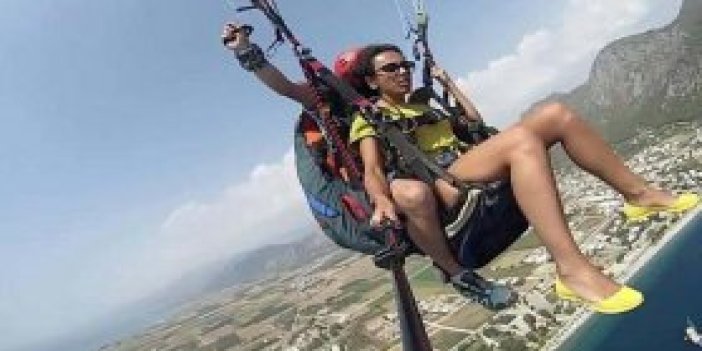 Yamaç paraşütü yapan kadın korkudan ne yapacağını şaşırdı