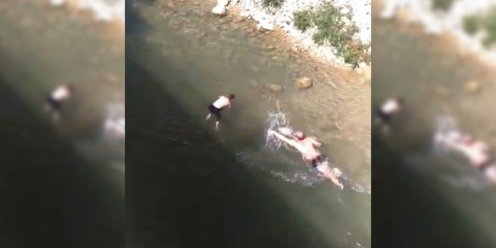  Nehirde boğulmak üzere olan çocuğu gazeteci kurtardı