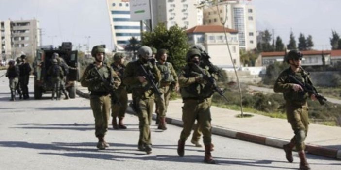 İsrail askerleri 150 Filistinliyi alıkoydu