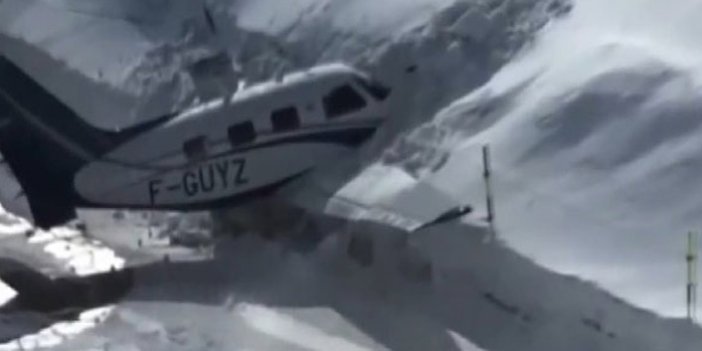 Uçak, pist dışındaki kar yığınına çarparak durabildi