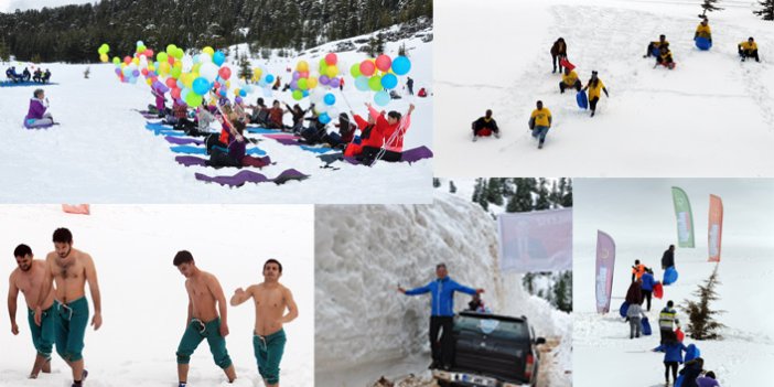 Kayak merkezi için leğenle kayıp karda güreştiler