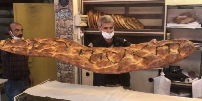 2 metre 45 santimlik pideyle ‘Evde kal Türkiye’ çağrısında bulundu