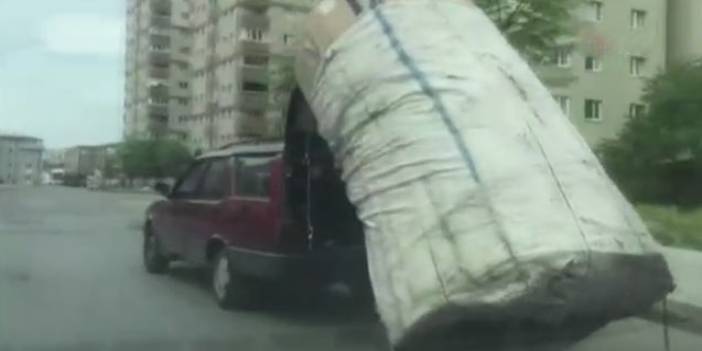 Yokuşu çıkamayan kağıt toplayıcısına otomobili ile yardım etti