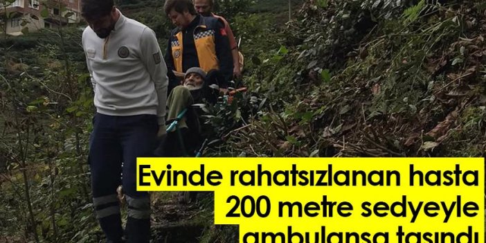 Rize'de evinde rahatsızlanan hasta 200 metre sedyeyle ambulansa taşındı