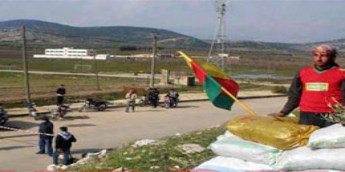 Suriye PKK'ya resmen kucak açtı